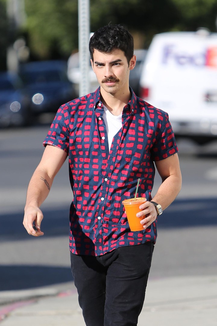 Joe Jonas keeps his Movember Mustache
